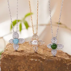 Detailed view of S925 sterling silver necklaces featuring pearl, larimar and green jade clovers