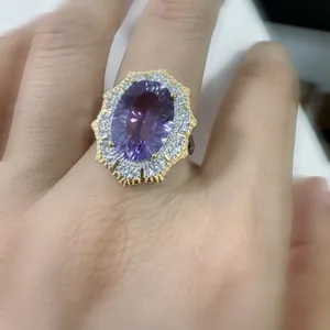 Close-up view of a Victorian style S925 silver ring featuring an oval purple amethyst stone