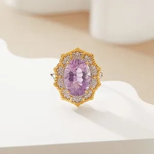Detailed view of a Victorian-style oval amethyst ring with double pave setting