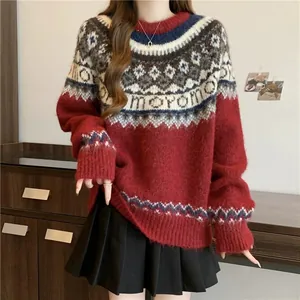 Cozy red Fair Isle Christmas sweater detail showing the intricate knit pattern and fit