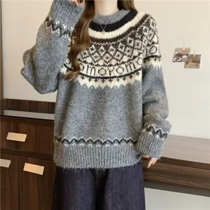 Detailed view of the intricate Fair Isle yoke pattern on this cozy grey knit cashmere sweater