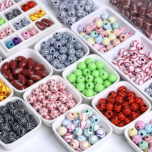 Detailed view of various acrylic sports-themed beads for DIY jewelry making