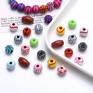 Close-up of various colorful acrylic sports ball beads for DIY jewelry and necklace making