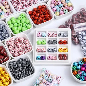 Variety of acrylic sports ball beads for DIY jewelry making including basketball and rugby