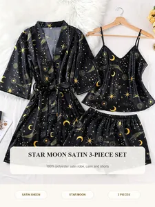 Detail view of the elegant black star and moon satin 3-piece pajama set with robe