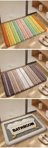 Absorbent tufted bathroom mats with colorful stripes and bathtub design