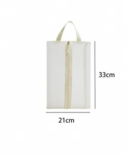 Detail of small portable travel shoe bag showing 33cm height and 21cm width dimensions