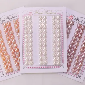 Detail of three freshwater pearl bracelet sets on display cards in white and pink tones.