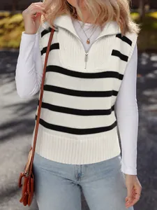 Close-up of women's striped knit vest featuring a silver zipper and lapel collar detail.