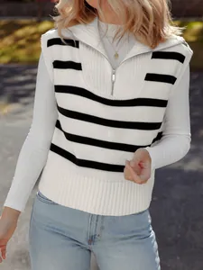 Detail of women's autumn striped knitted vest with zipper lapel and white knit texture