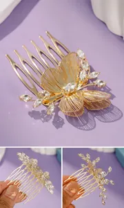 Vista detallada de un peine para el cabello de mariposa dorado con cristales brillantes.