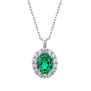 Elegant vintage S925 silver necklace with an oval lab-grown emerald halo pendant.