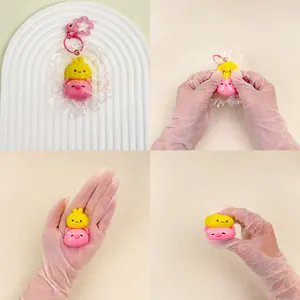 Macro view of cute animal silicone squeeze toy showing its soft texture and star keychain.