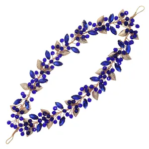 Elegant vintage hollow gold leaf headband with blue crystals for weddings and travel shots