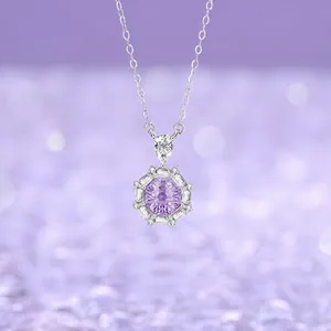 Close-up of octagonal purple gemstone necklace with shimmering diamond accents and silver chain.