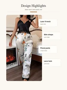 Detail view of black lace camisole and floral print satin pajama set with design highlights
