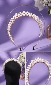 Close-up of elegant pearl halo headband with gold wire for bridal hair styling