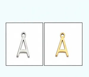 Macro view showing detailed gold and silver stainless steel letter A jewelry pendants
