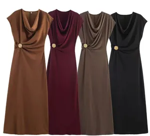 Detailed view of elegant sleeveless cowl neck maxi dresses in four colors with gold buckles.