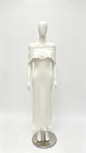Elegant white off-the-shoulder knitted maxi dress with ruffled collar and slim fit silhouette