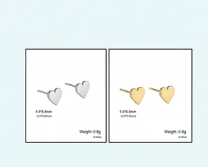Detailed view of small stainless steel heart stud earrings in silver and gold finishes.