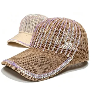 Macro detail view of rhinestone mesh baseball caps showing breathable hollow weave.