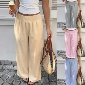 Detailed view of women's high-waisted wide-leg trousers in various summer colors