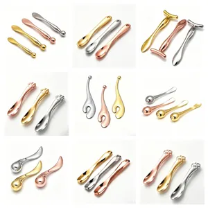 Collection de cuillères à crème pour les yeux et masseurs en métal or, argent et or rose