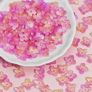 Detailed view of 10mm shimmering pink four-petal flower beads for DIY crafts