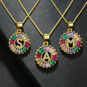 Gold plated initial necklace featuring colorful zircon stones and letter S, A, M pendants