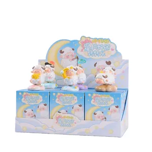 Adorable sheep figurines set with star and moon themed blind box packaging display