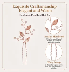 Detailed view of handmade hair pin featuring metallic leaves and elegant white pearls