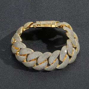 Close-up of 22mm gold-plated bubble Cuban link chain with micro-pavé zirconia crystals.