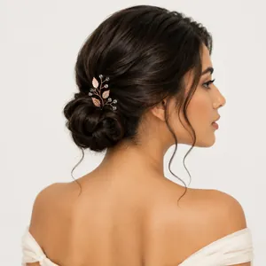 Elegant rose gold metal leaf hair pin accessory with pearls for bridal wedding styling