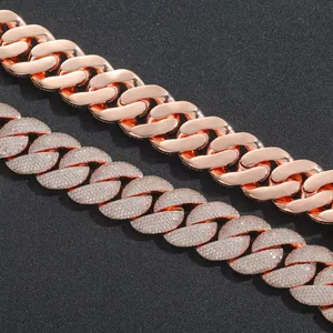 Close-up detail of 22mm rose gold Cuban link chains featuring smooth and pavé-set styles.