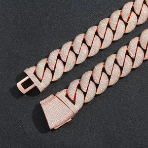 Close-up of 22mm rose gold bubble Cuban link chain with iced out micro-pave crystals