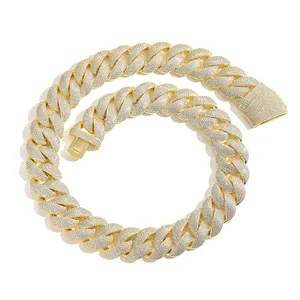 Detailed view of a 22mm iced out gold Cuban link chain necklace for men's hip-hop style