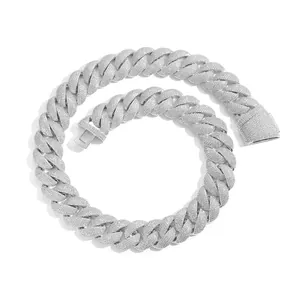 Detailed view of a 22mm silver iced-out Cuban link chain necklace for men hip hop style.