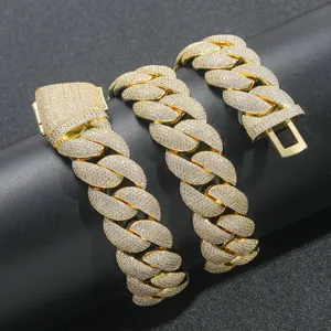 Close-up detail of 22mm gold-plated iced-out bubble Cuban link necklace with pavé stones
