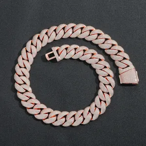 Detailed macro view of an iced out 22mm rose gold Cuban link chain necklace for men.