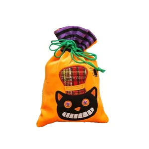Halloween drawstring candy bag with cute black cat embroidery on orange velvet fabric