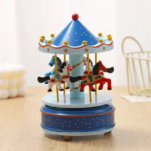 Vintage blue and white wooden carousel music box with hand-painted horses as a gift