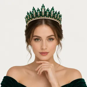 Detailed view of an emerald green crystal tiara worn by a model for banquet events