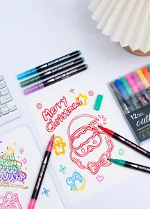 Set of dual-line outline markers for DIY Christmas card drawing and journaling.
