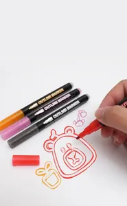 Close-up showing the shimmering effect of a red double-line outline marker on paper