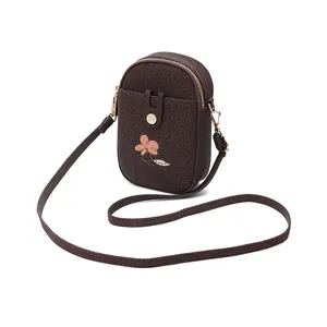 Petit sac à bandoulière marron foncé pour téléphone avec broderie et fermeture dorée