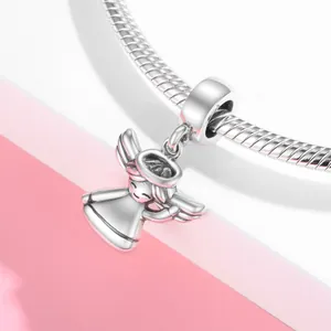 Detailed close-up of a S925 sterling silver angel charm pendant on a snake chain bracelet