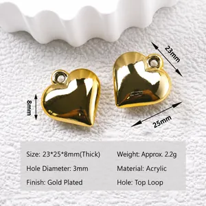 Detailed view of gold heart-shaped acrylic pendants with specific size dimension labels