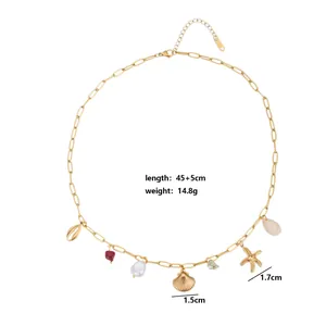 Detailed view of gold stainless steel necklace with shell and starfish charms.