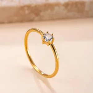 Elegant six-prong solitaire ring in 18k gold plated stainless steel for women.